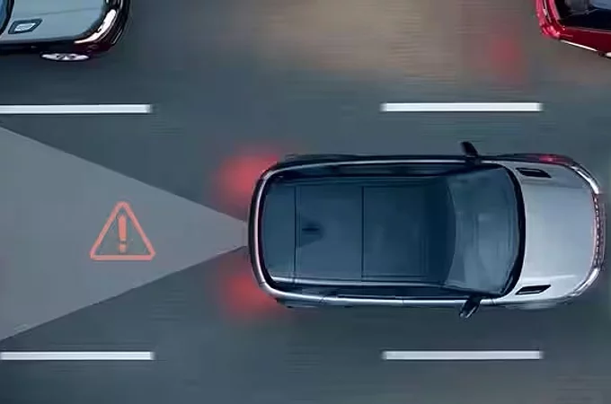 Стилізоване зображення системи попередження про зіткнення при русі заднім ходом Land Rover