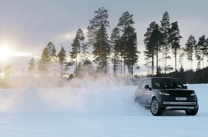 Range Rover driving in snow land