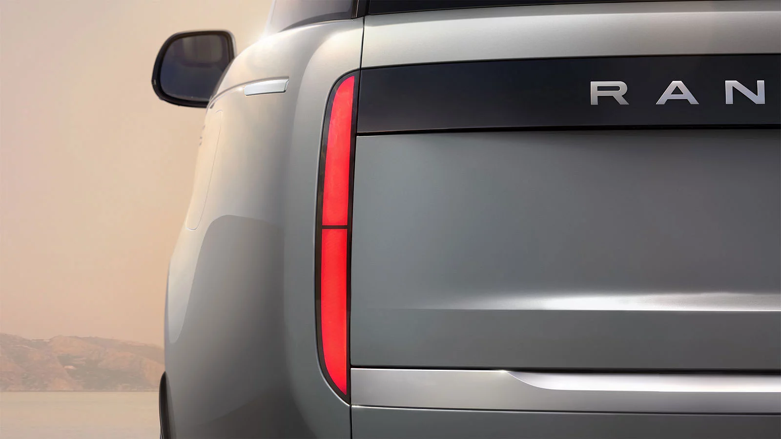 The tail light of a fully electric Range Rover