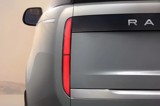 The tail light of a fully electric Range Rover