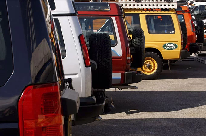 Back of 5 original Discovery vehicles all lined up