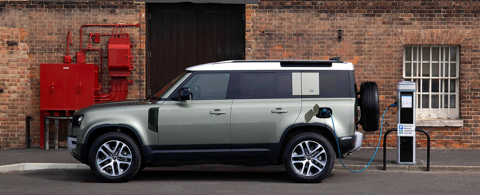 Defender Parked On The Roadside Charging Station