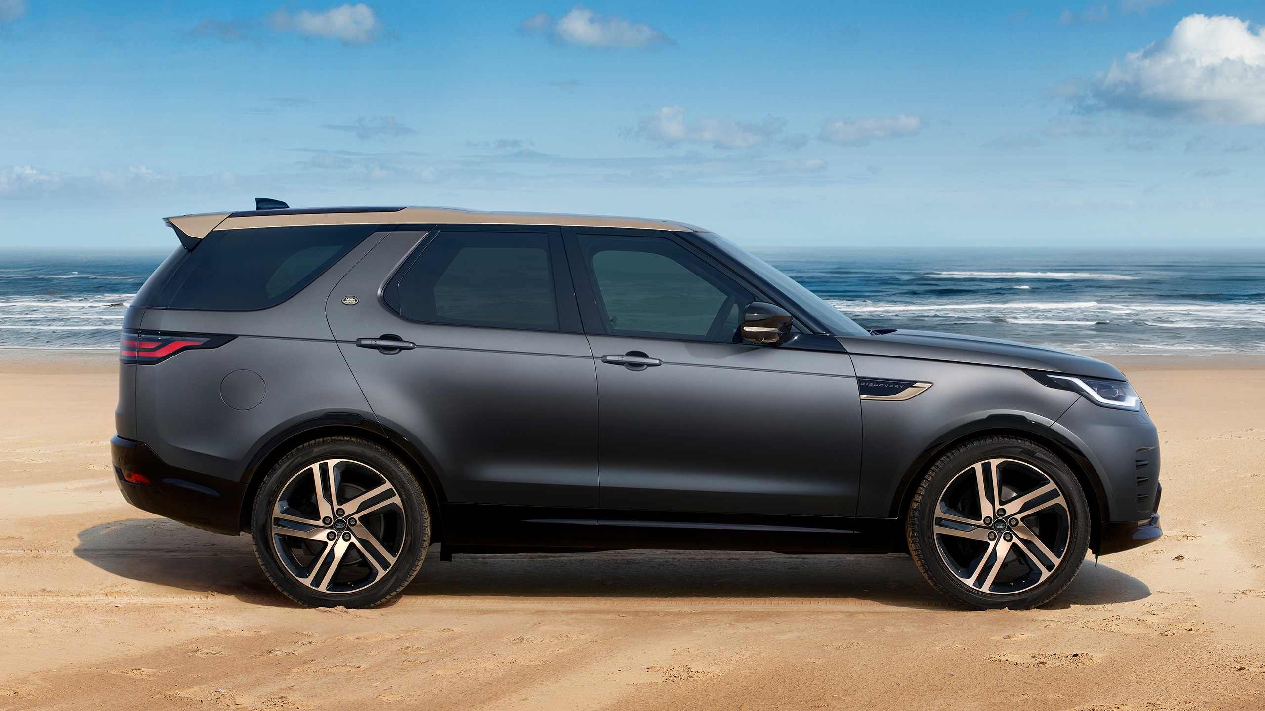 New Range Rover driving on mountain runway road
