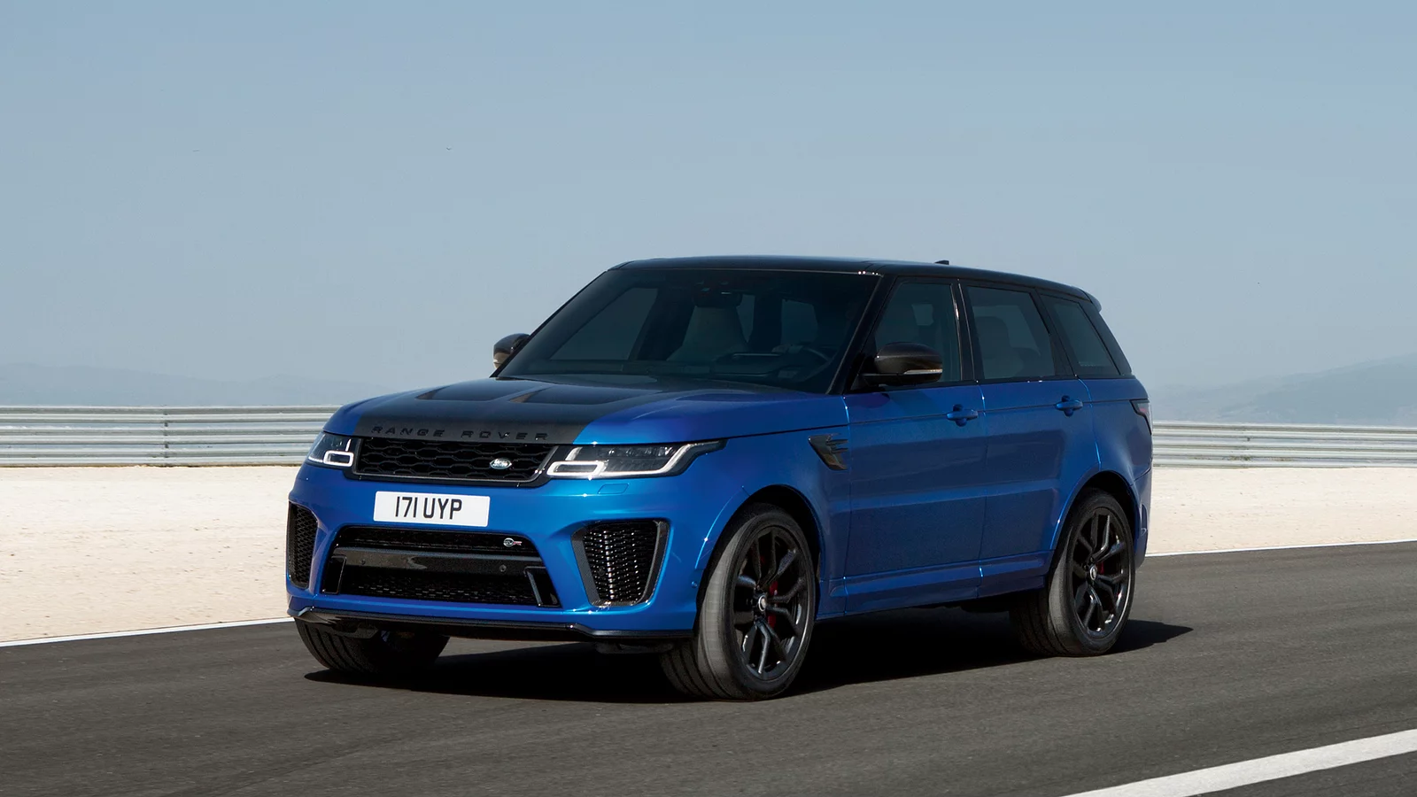 Range Rover Sports SUV parked on bridge