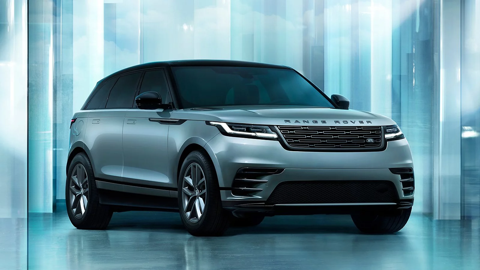 Range Rover Velar outside of glass house