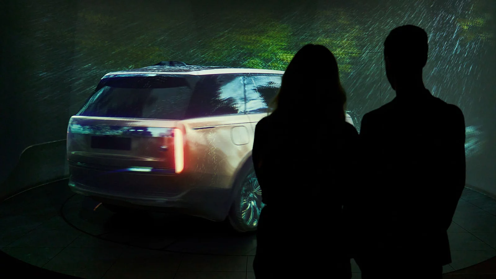 Range Rover driving on road 