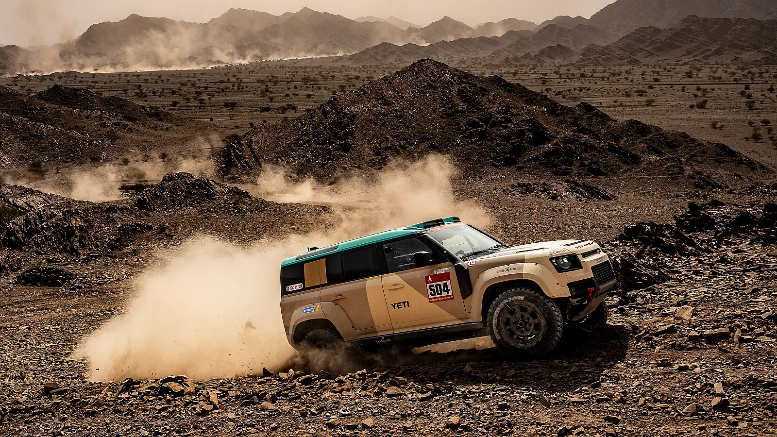 DEFENDER Dakar off-roading on rocky hill