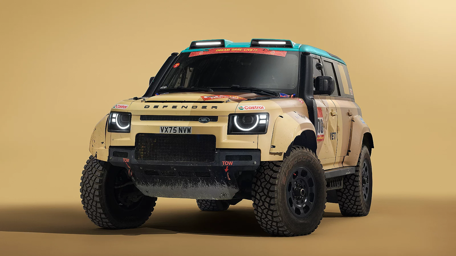 Front three-quarter view of a Defender Dakar studio shot