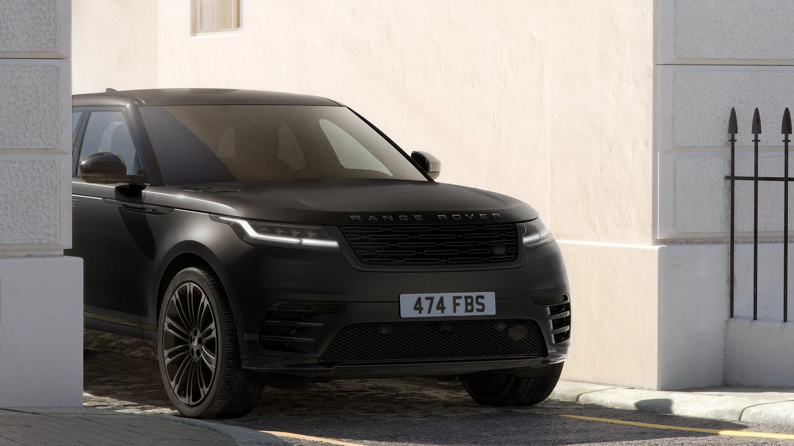 Range Rover Velar belgravia satin driving on road