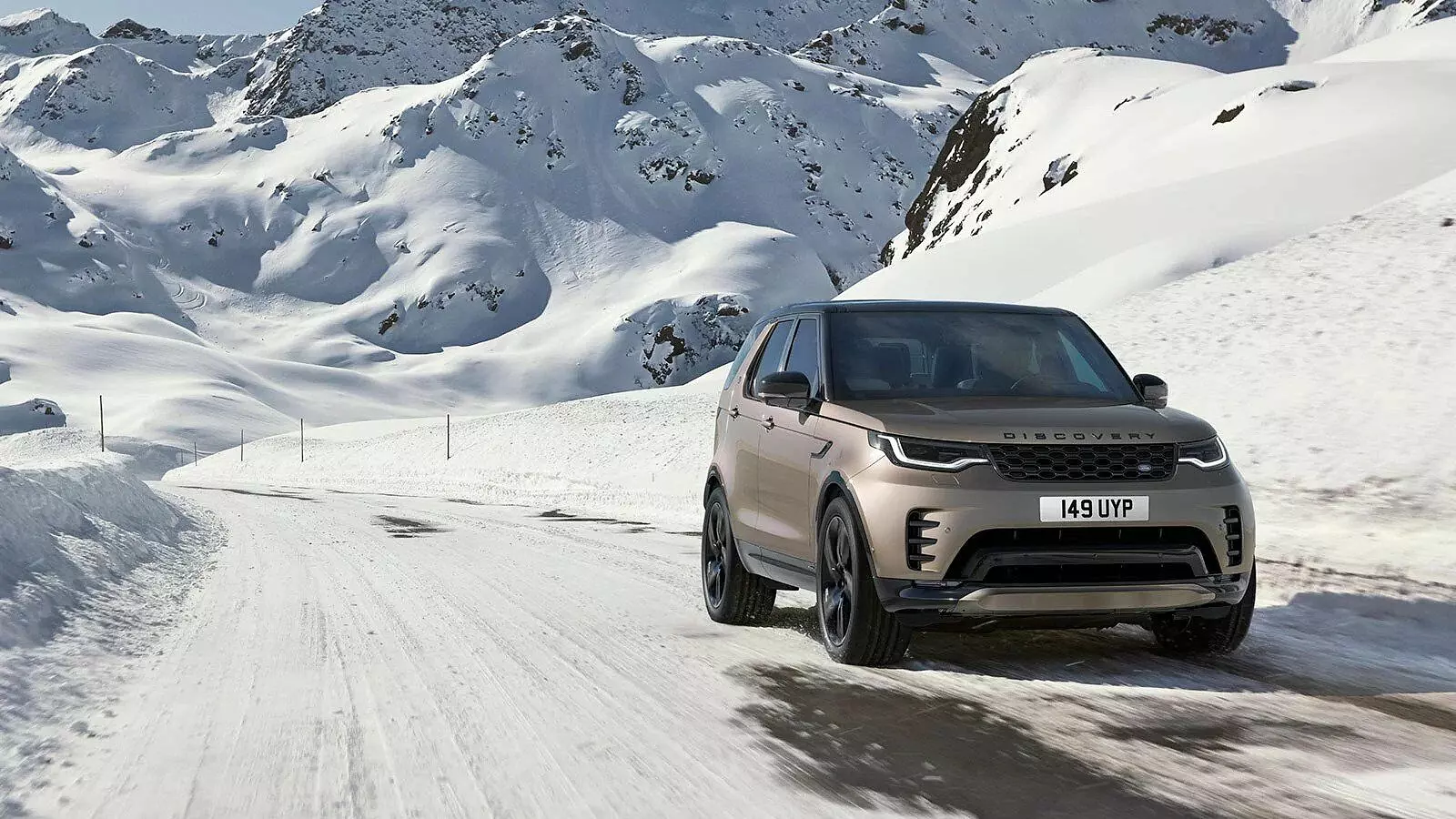 Discovery driving on the snowy road