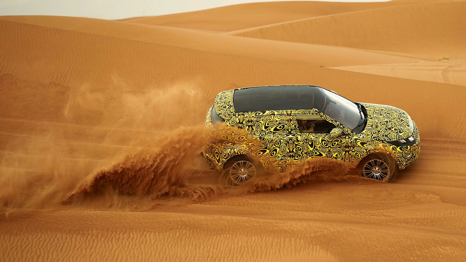 A car driving through the desert