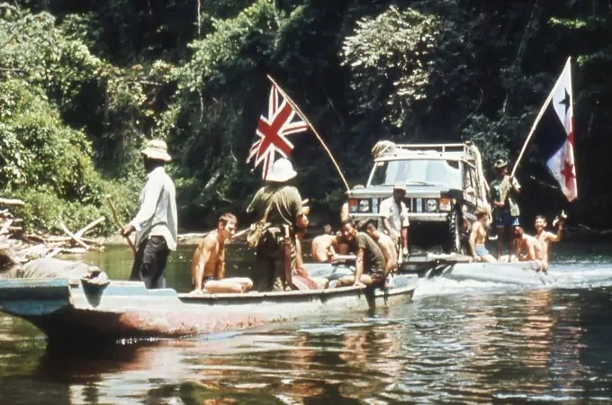 The expedition team cross a water way in the Darien Gap