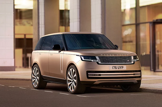 New Range Rover parked on a road