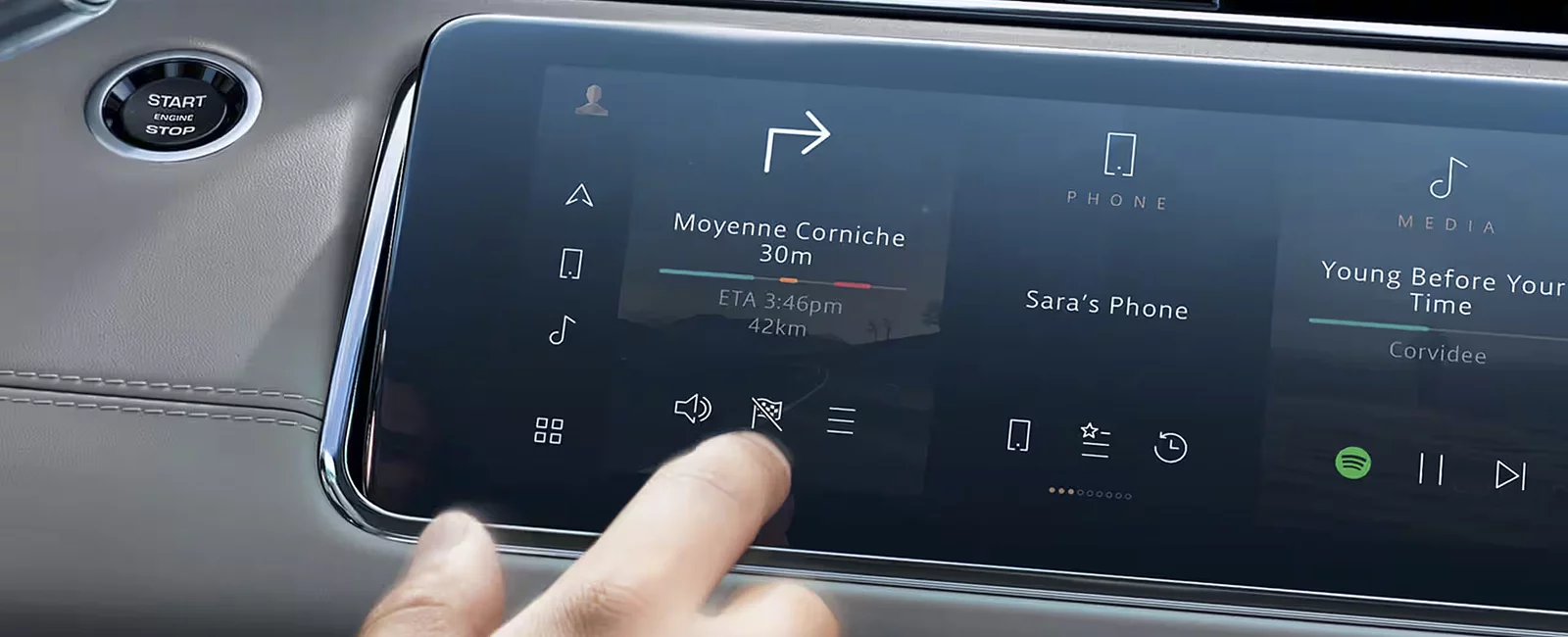 Close up mans hand select the application of navigation or maps on the car dashboard